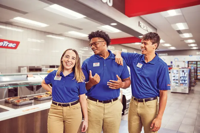 three RaceTrac store associates