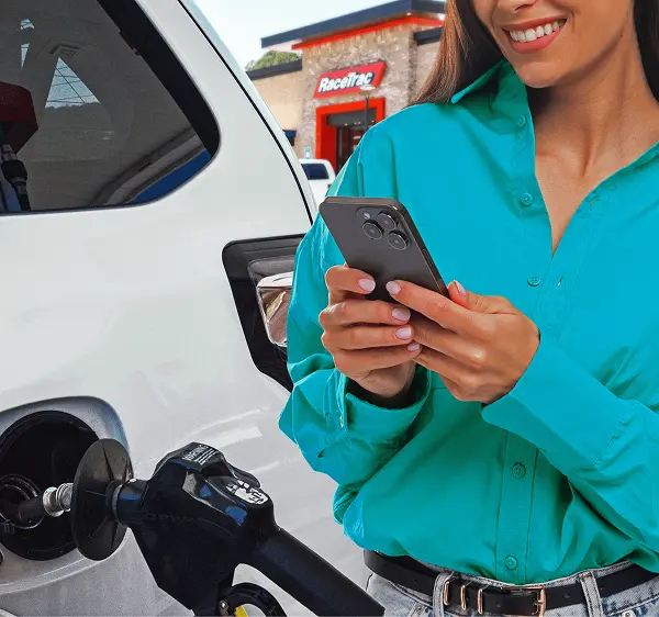 Woman reloading her RaceTrac gift card