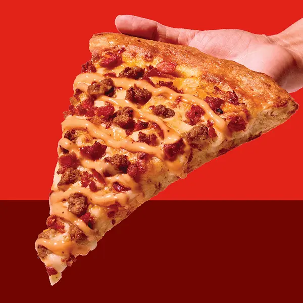 Slice of bacon cheeseburger pizza from RaceTrac