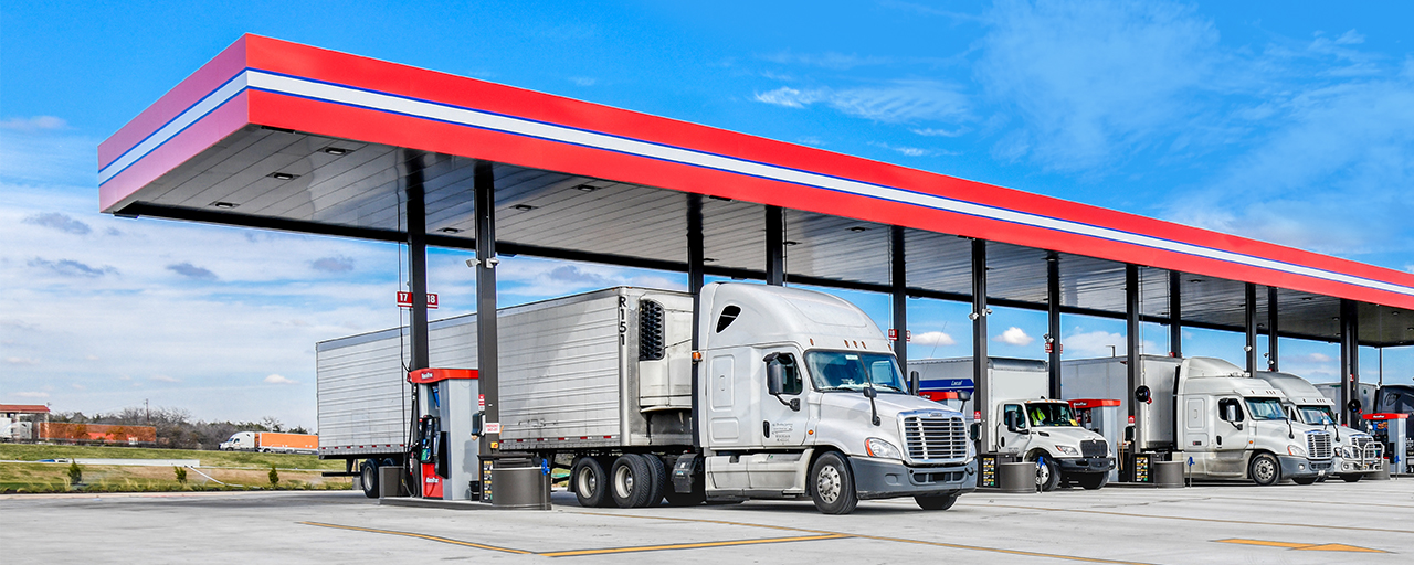 Sem tucks under a RaceTrac fuel canopy.
